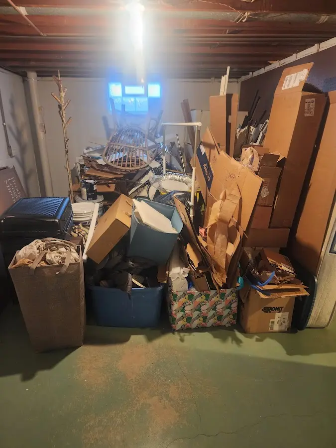 Roll-off dumpster container at job site for 2 Yard Dumpster Rental in New Milford